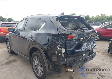 2021 Mazda Cx-5 Grand Touring z USA, uszkodzony, nr VIN JM3KFBDM7M1306409